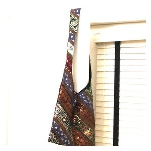 A bling crossbody purse.